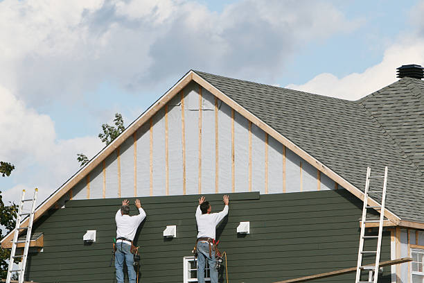 Professional Siding Replacement technician working in Snow Camp, NC